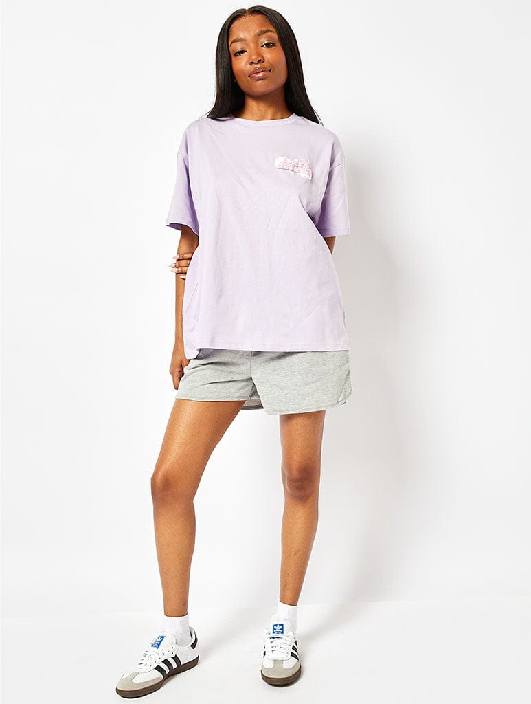 Care Bears Varsity T-Shirt in Lilac Tops & T-Shirts Skinnydip London