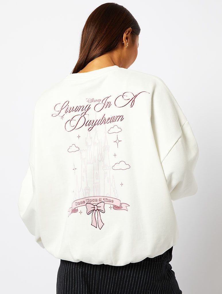 Disney Living In A Daydream Sweatshirt in Ecru Hoodies & Sweatshirts Skinnydip London