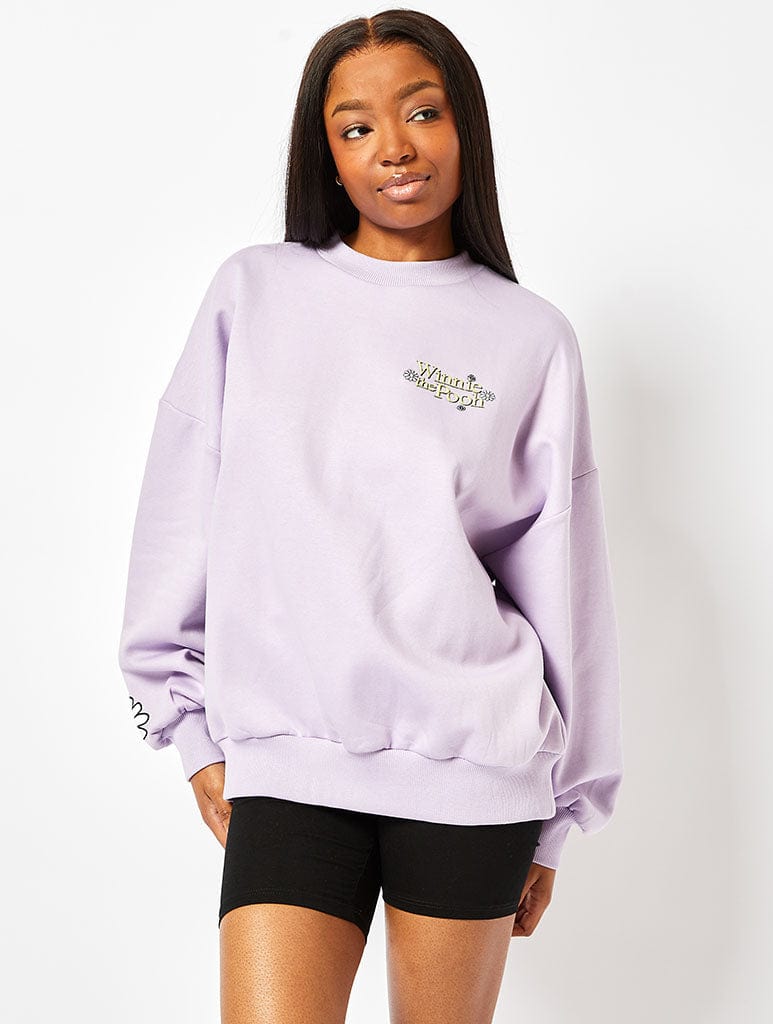 Disney Winnie the Pooh Sweatshirt in Lilac Hoodies & Sweatshirts Skinnydip London