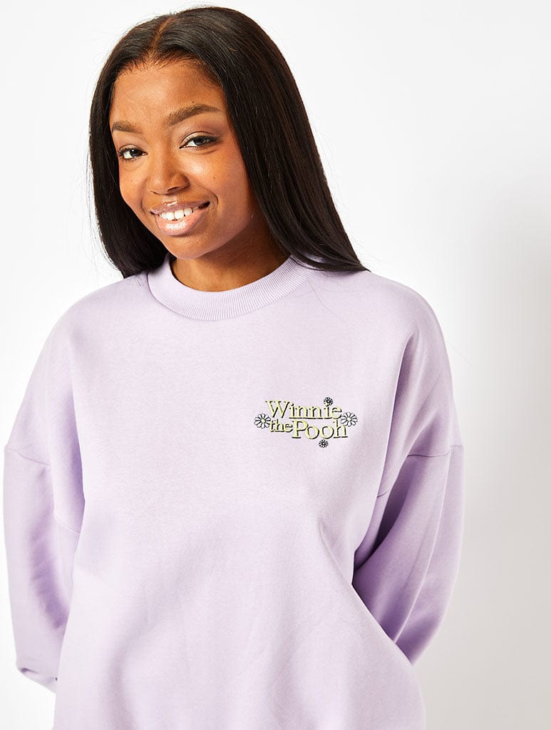 Disney Winnie the Pooh Sweatshirt in Lilac Hoodies & Sweatshirts Skinnydip London