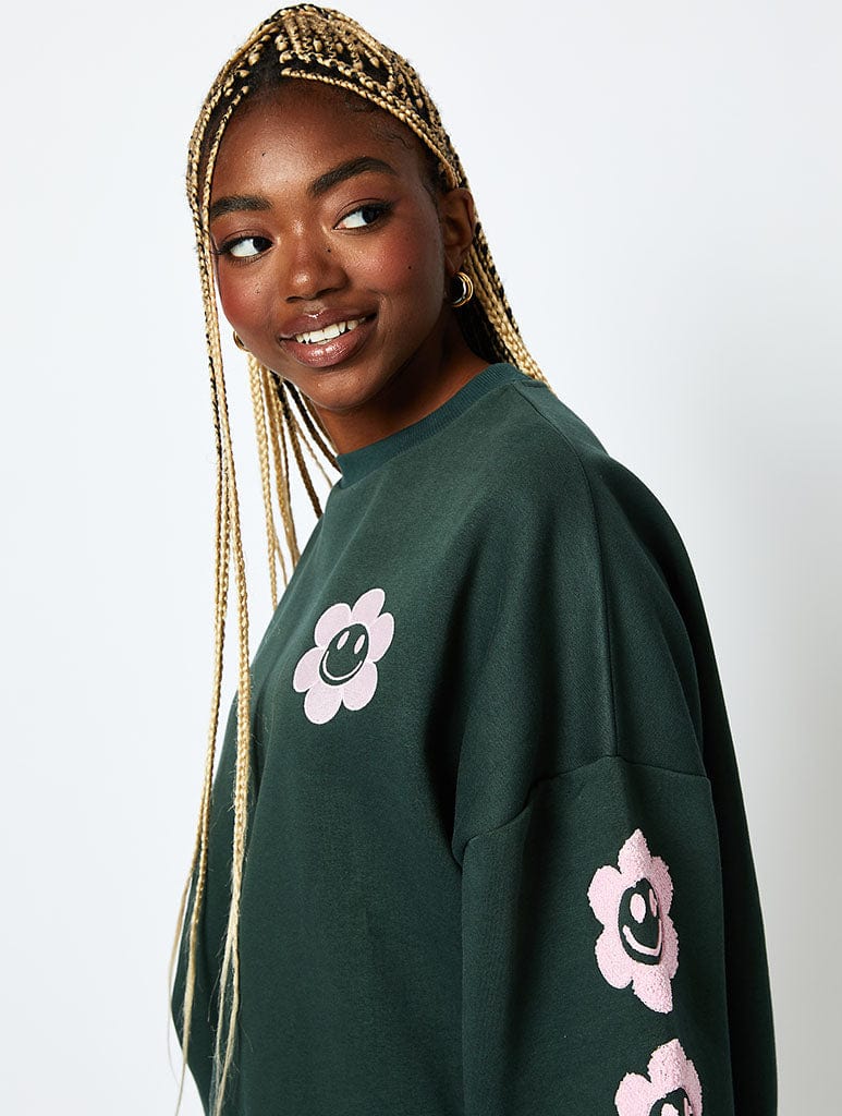 Don't Quit Your Daydream Sweatshirt in Green Hoodies & Sweatshirts Skinnydip London