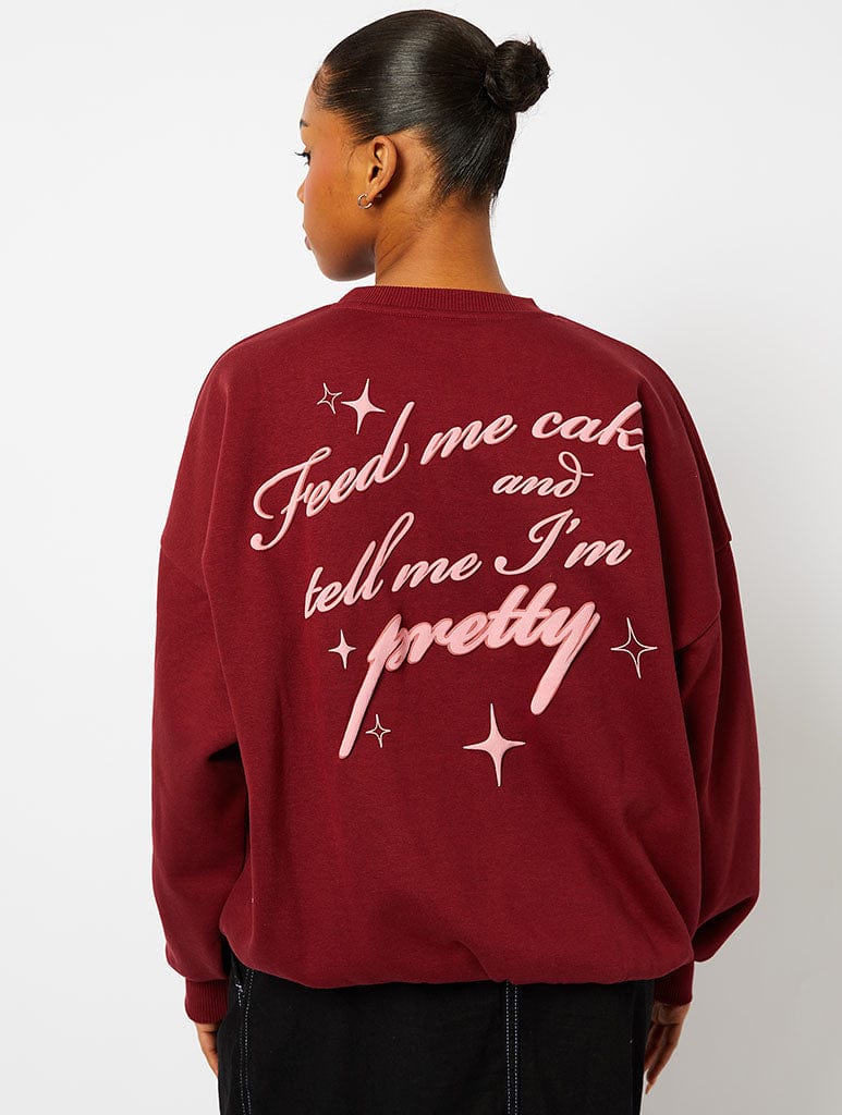 Feed Me Cake Sweatshirt in Burgundy Hoodies & Sweatshirts Skinnydip London