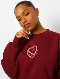 Feed Me Cake Sweatshirt in Burgundy Hoodies & Sweatshirts Skinnydip London