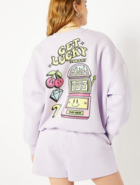 Get Lucky Oversized Sweatshirt in Purple Hoodies & Sweatshirts Skinnydip London