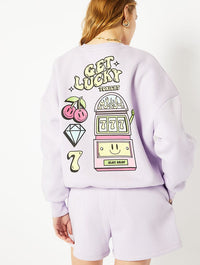 Get Lucky Oversized Sweatshirt in Purple Hoodies & Sweatshirts Skinnydip London