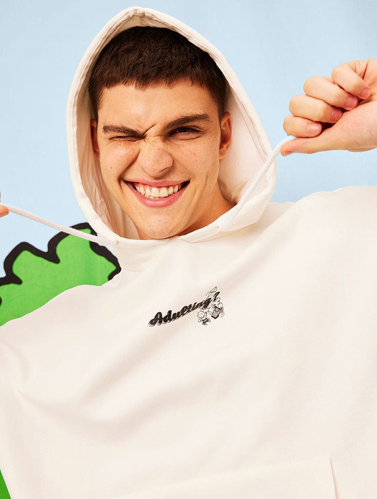 Peanuts x Skinnydip Snoopy Adulting Hoodie in Ecru Hoodies & Sweatshirts Skinnydip London