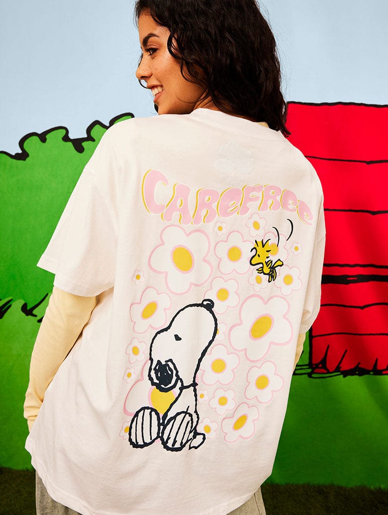 Peanuts x Skinnydip Snoopy Care Free T-Shirt in Ecru Tops & T-Shirts Skinnydip London