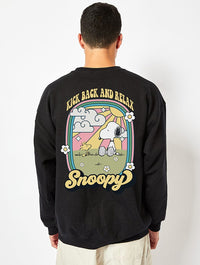 Peanuts x Skinnydip Snoopy Kick Back & Relax Sweatshirt in Black Hoodies & Sweatshirts Skinnydip London