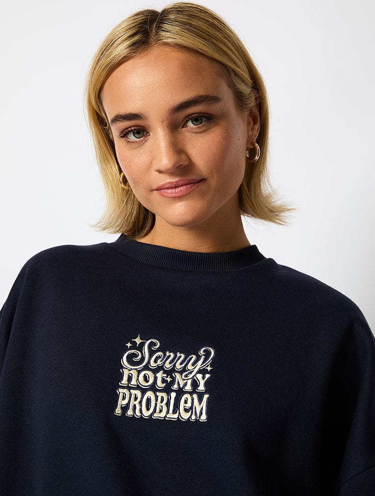 Sorry Not My Problem Sweatshirt in Navy Hoodies & Sweatshirts Skinnydip London