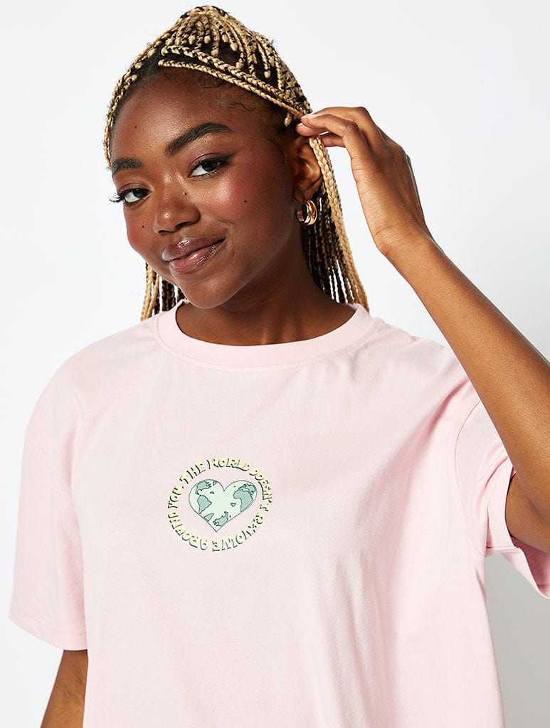 The World Doesnt Revolve Around You T-Shirt in Pink Tops & T-Shirts Skinnydip London