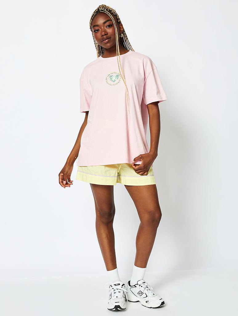 The World Doesnt Revolve Around You T-Shirt in Pink Tops & T-Shirts Skinnydip London