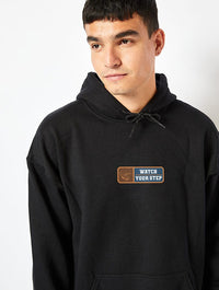 Watch Your Step Hoodie in Black Hoodies & Sweatshirts Skinnydip London