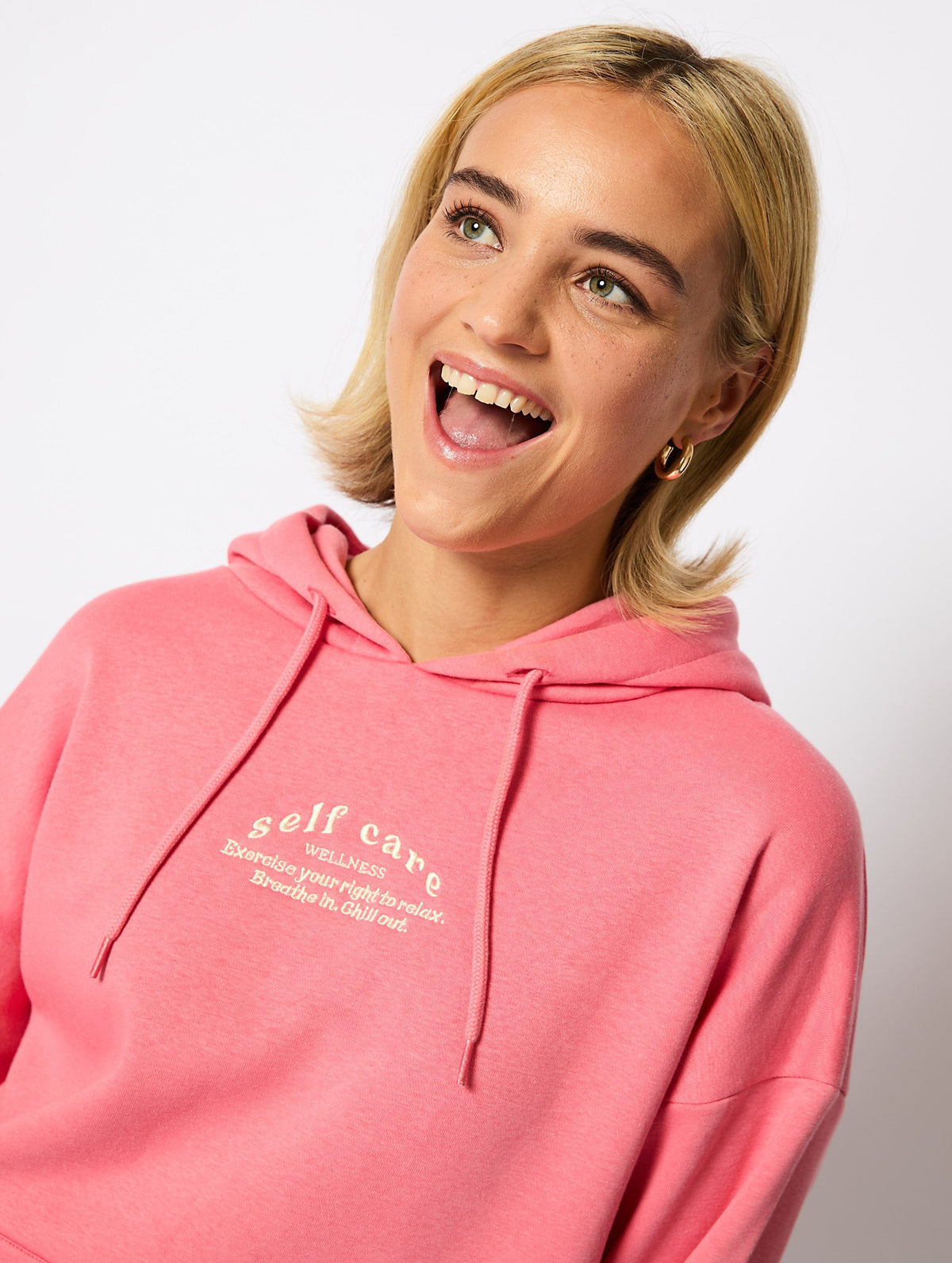 Wellness Hoodie in Pink Hoodies & Sweatshirts Skinnydip London