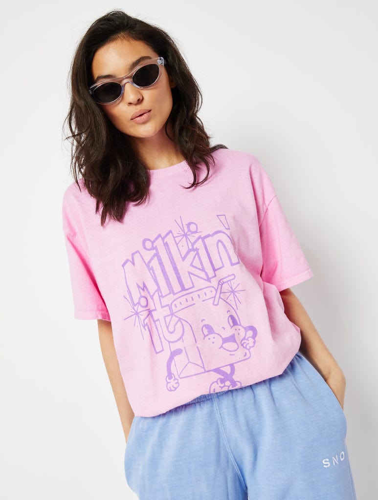 Milking it Graphic Oversized T-Shirt in Pink Tops & T-Shirts Skinnydip London