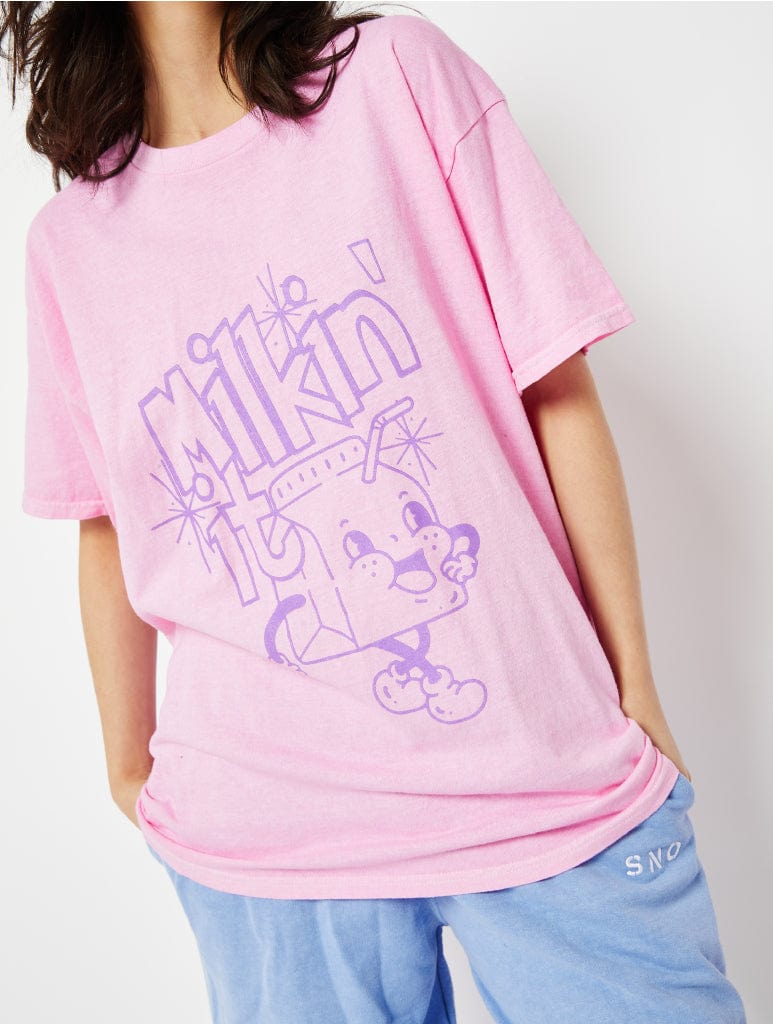 Milking it Graphic Oversized T-Shirt in Pink Tops & T-Shirts Skinnydip London