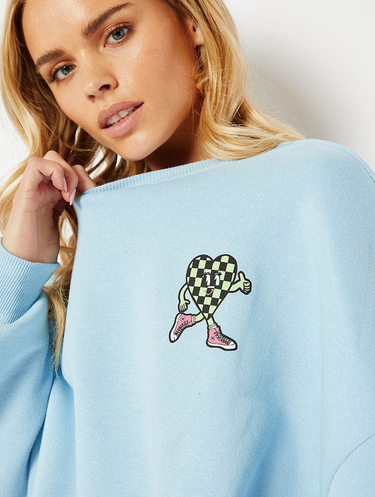 Walking Disaster Graphic Oversized Sweatshirt In Blue Hoodies & Sweatshirts Skinnydip London