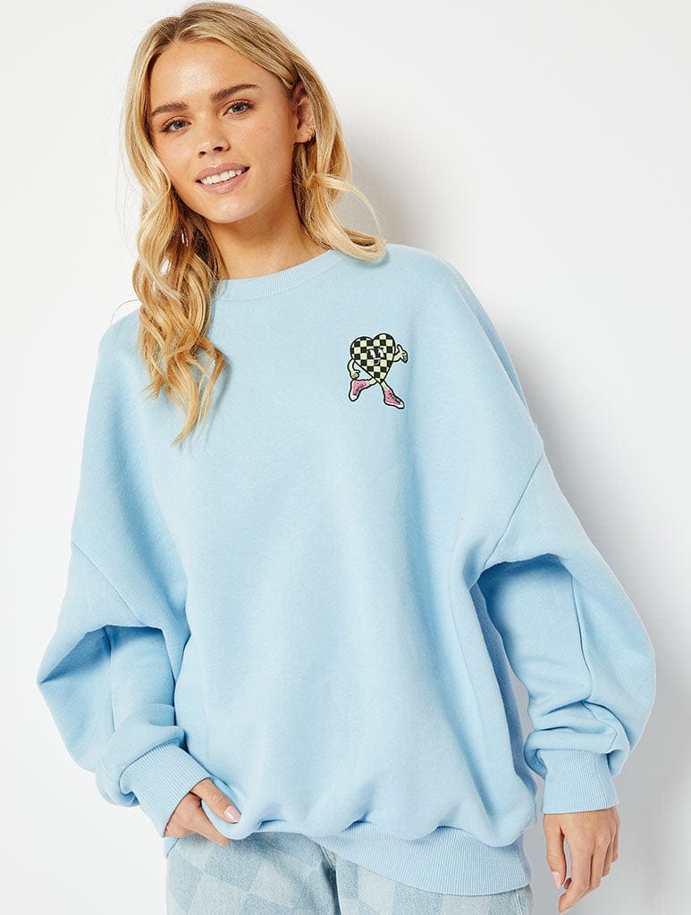 Walking Disaster Graphic Oversized Sweatshirt In Blue Hoodies & Sweatshirts Skinnydip London